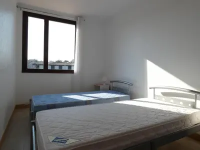 Un ou plusieurs lits dans un hébergement de l'établissement Maison 2 Chambres près Plage et Commerces - Parking Privé - FR-1-323-366