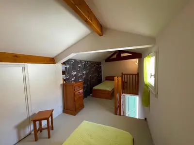 Un ou plusieurs lits dans un hébergement de l'établissement Maison 4-5 pers à Saint Jean de Monts avec piscine, proche plage et forêt - FR-1-323-478