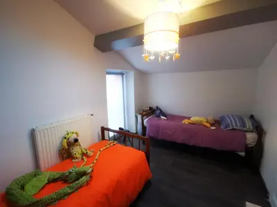 Un ou plusieurs lits dans un hébergement de l'établissement Trentemoult : Charmante grande maison avec vue sur Loire 105 m2