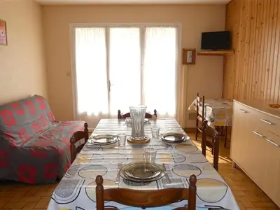 Coin salon dans l'établissement Maison calme proche plage, animaux admis, parking - FR-1-323-376