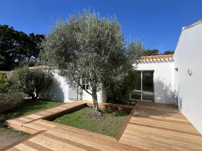 Jardin de l'établissement Maison pour 14 - 150 m de la plage de la Clère