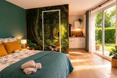 Un ou plusieurs lits dans un hébergement de l'établissement RELAI DU CHATEAU APPARTHOTEL