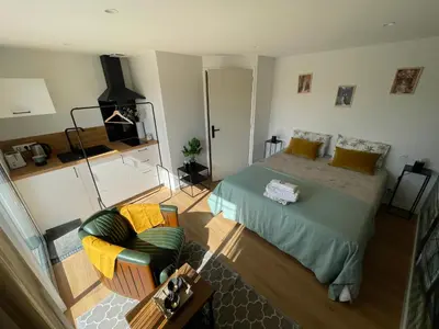 Un ou plusieurs lits dans un hébergement de l'établissement RELAI DU CHATEAU APPARTHOTEL