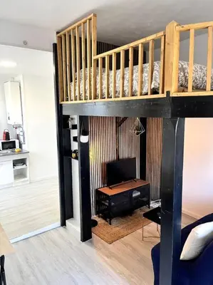 Un ou plusieurs lits dans un hébergement de l'établissement Studio Petit Colombel 2pers Quartier St Felix