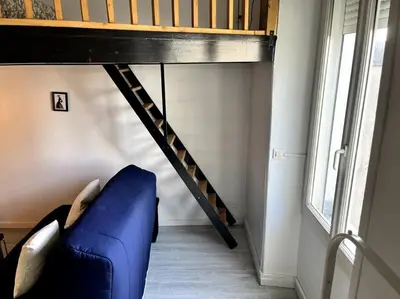 Un ou plusieurs lits superposés dans un hébergement de l'établissement Studio Petit Colombel 2pers Quartier St Felix