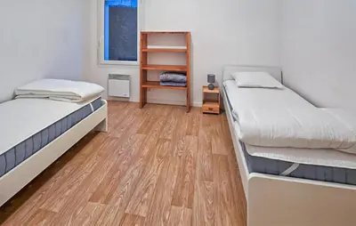 Un ou plusieurs lits dans un hébergement de l'établissement 2 Bedroom Nice Apartment In Le Pellerin