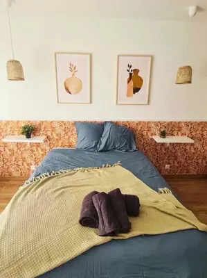 Un ou plusieurs lits dans un hébergement de l'établissement Charmante maisonnette - St naz- Comme à la maison