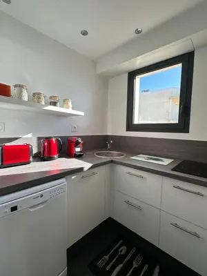 Cuisine ou kitchenette dans l'établissement T2 La vue panoramique sur l'océan à 180