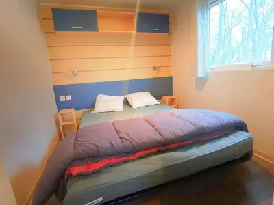 Un ou plusieurs lits dans un hébergement de l'établissement Mobil home Clim+ Confort PUY du FOU 2Chb / 5Pers