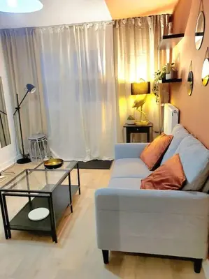 Coin salon dans l'établissement Duplex neuf - à 5 min de Nantes