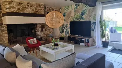 Télévision ou salle de divertissement dans l'établissement Un petit coin de paradis près de Rennes