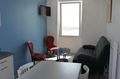 Coin salon dans l'établissement Magnifique logement vue mer : BELLE ILE