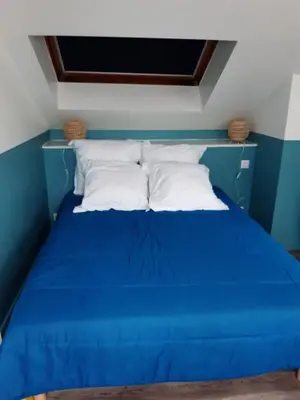Un ou plusieurs lits dans un hébergement de l'établissement Petite maison proche plage 2/4 p