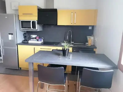 Cuisine ou kitchenette dans l'établissement Maison calme, près du puy du fou