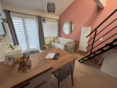 Coin salon dans l'établissement Le nid Montois, 50m de la plage de la baigneuse