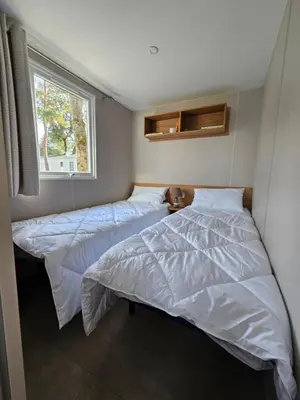 Un ou plusieurs lits dans un hébergement de l'établissement Jolie Mobil home 2 chambres (198)