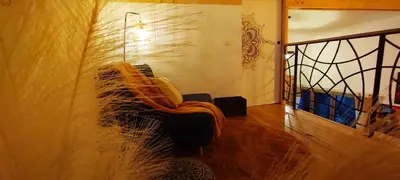 Coin salon dans l'établissement Maison avec hammam privé en option - Maison Mandala
