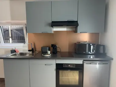 Cuisine ou kitchenette dans l'établissement Studio concorde proche Aéroport de Nantes