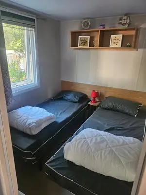 Un ou plusieurs lits dans un hébergement de l'établissement Mobil home 6 personnes