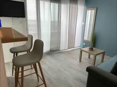 Télévision ou salle de divertissement dans l'établissement Studio 61, vue mer, wifi, parking privé