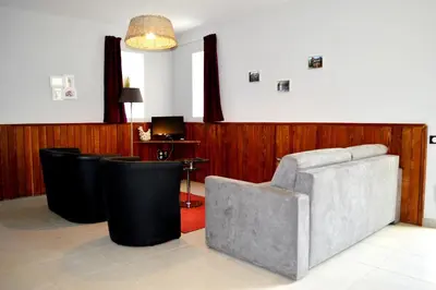 Coin salon dans l'établissement Les Logis du Hallay