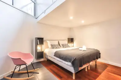 Un ou plusieurs lits dans un hébergement de l'établissement NOCNOC Loft L'atypique - 185m2 Centre de Nantes