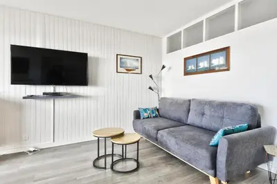 Télévision ou salle de divertissement dans l'établissement Aux portes de l'océan à Saint-Jean-de-Monts