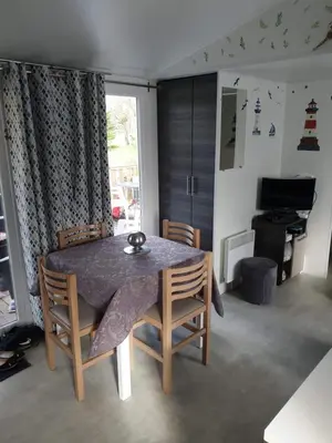 Coin salon dans l'établissement Mobile home 6 personnes