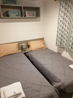 Un ou plusieurs lits dans un hébergement de l'établissement Mobile home 6 personnes