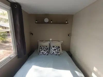 Un ou plusieurs lits dans un hébergement de l'établissement Mobil-home, 3 ch , 6 personnes 800CR