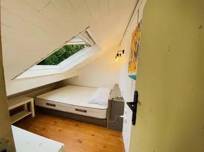 Un ou plusieurs lits dans un hébergement de l'établissement Tiny House dans la verdure et le calme