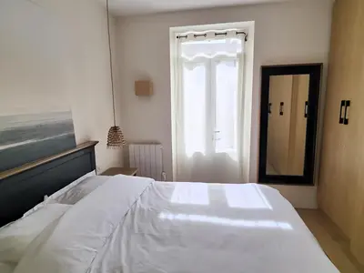 Un ou plusieurs lits dans un hébergement de l'établissement Pied à terre en bord de mer
