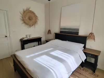 Un ou plusieurs lits dans un hébergement de l'établissement Pied à terre en bord de mer