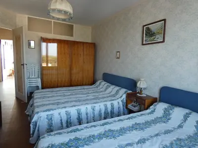 Un ou plusieurs lits dans un hébergement de l'établissement Appartement 1 chambre avec vue mer pour 6 personnes - FR-1-323-307