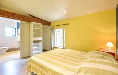Un ou plusieurs lits dans un hébergement de l'établissement Nice Home In La Chapelle Hermier