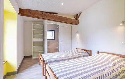 Un ou plusieurs lits dans un hébergement de l'établissement Nice Home In La Chapelle Hermier