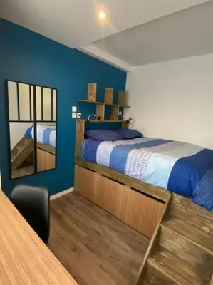 Un ou plusieurs lits dans un hébergement de l'établissement Studio neuf à Bouguenais+terrasse+parking