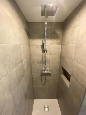 Salle de bains dans l'établissement Studio neuf à Bouguenais+terrasse+parking
