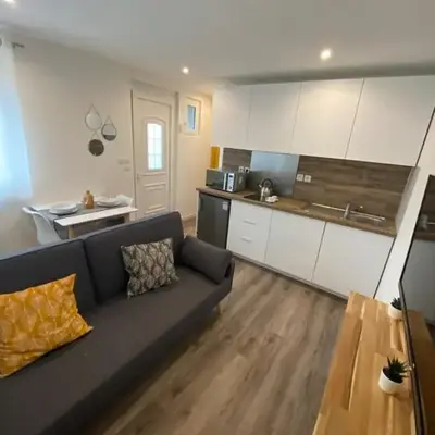 Studio neuf avec jardin privatif