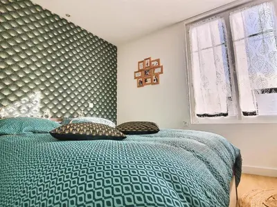 Un ou plusieurs lits dans un hébergement de l'établissement Appartement de standing - coeur de Rezé / 10min de Nantes