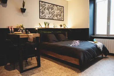 Un ou plusieurs lits dans un hébergement de l'établissement LOVE ROOM, La Douce Angevine