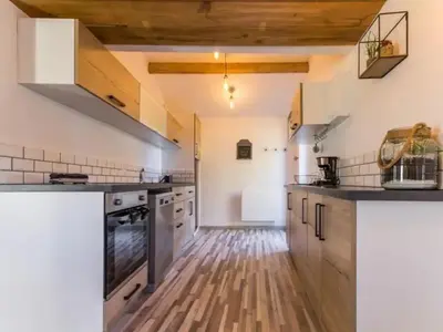 Cuisine ou kitchenette dans l'établissement Le Cocoon Briéron