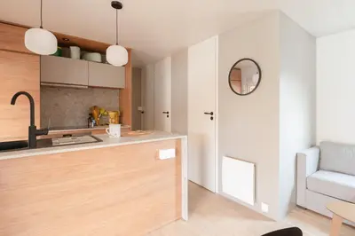 Cuisine ou kitchenette dans l'établissement Mobil-home 40m - Piscine - Jardin