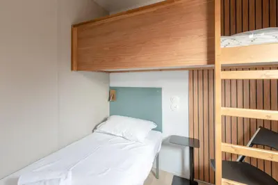 Un ou plusieurs lits dans un hébergement de l'établissement Mobil-home 40m - Piscine - Jardin