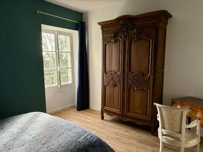 Un ou plusieurs lits dans un hébergement de l'établissement Château de la Pervenchère gîte des Cavaliers