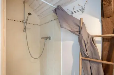 Salle de bains dans l'établissement Gîte les Arcades 25 couchages
