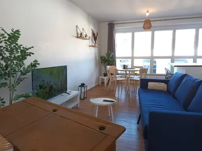 Télévision ou salle de divertissement dans l'établissement citybreak des balcons d'Ancenis