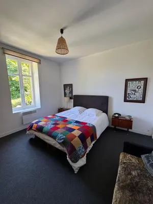 Un ou plusieurs lits dans un hébergement de l'établissement Cottage-Saint Laurent sur Sèvre