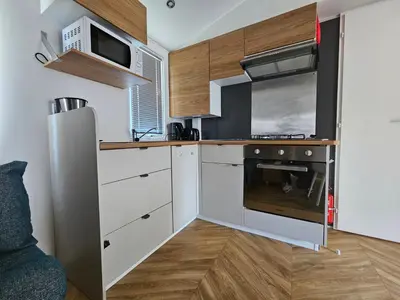 Cuisine ou kitchenette dans l'établissement Mobil home 3 chambres (413)