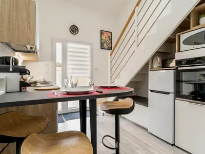 Cuisine ou kitchenette dans l'établissement Charmant gîte indépendant avec terrasse, proche plage et golf, idéal pour des vacances à Pornic - FR-1-306-1267